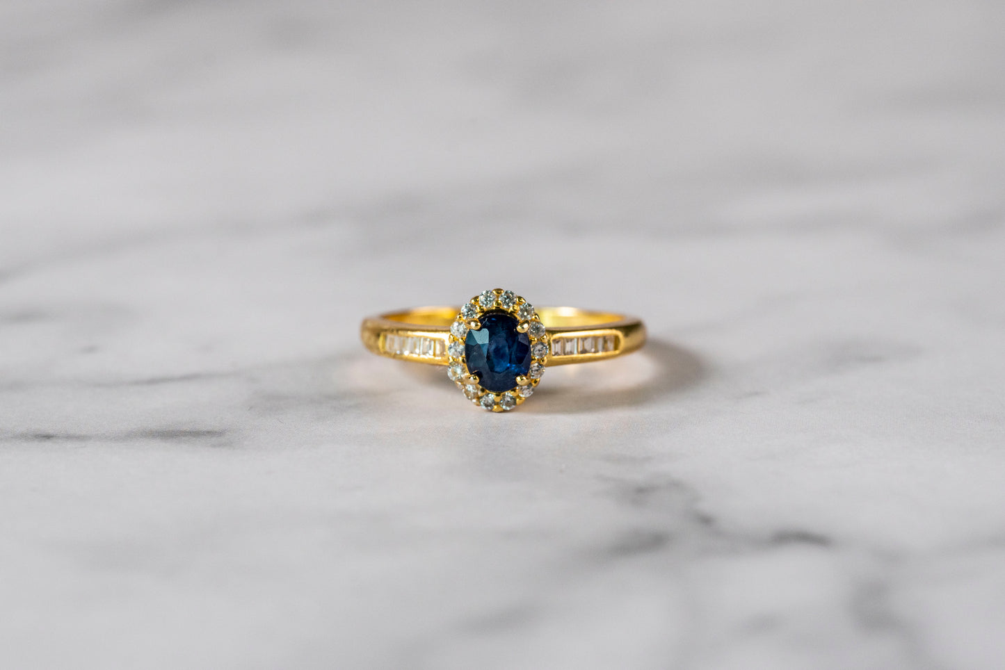 Oval Sapphire Elegance Ring with Diamond Accents in 18k Gold