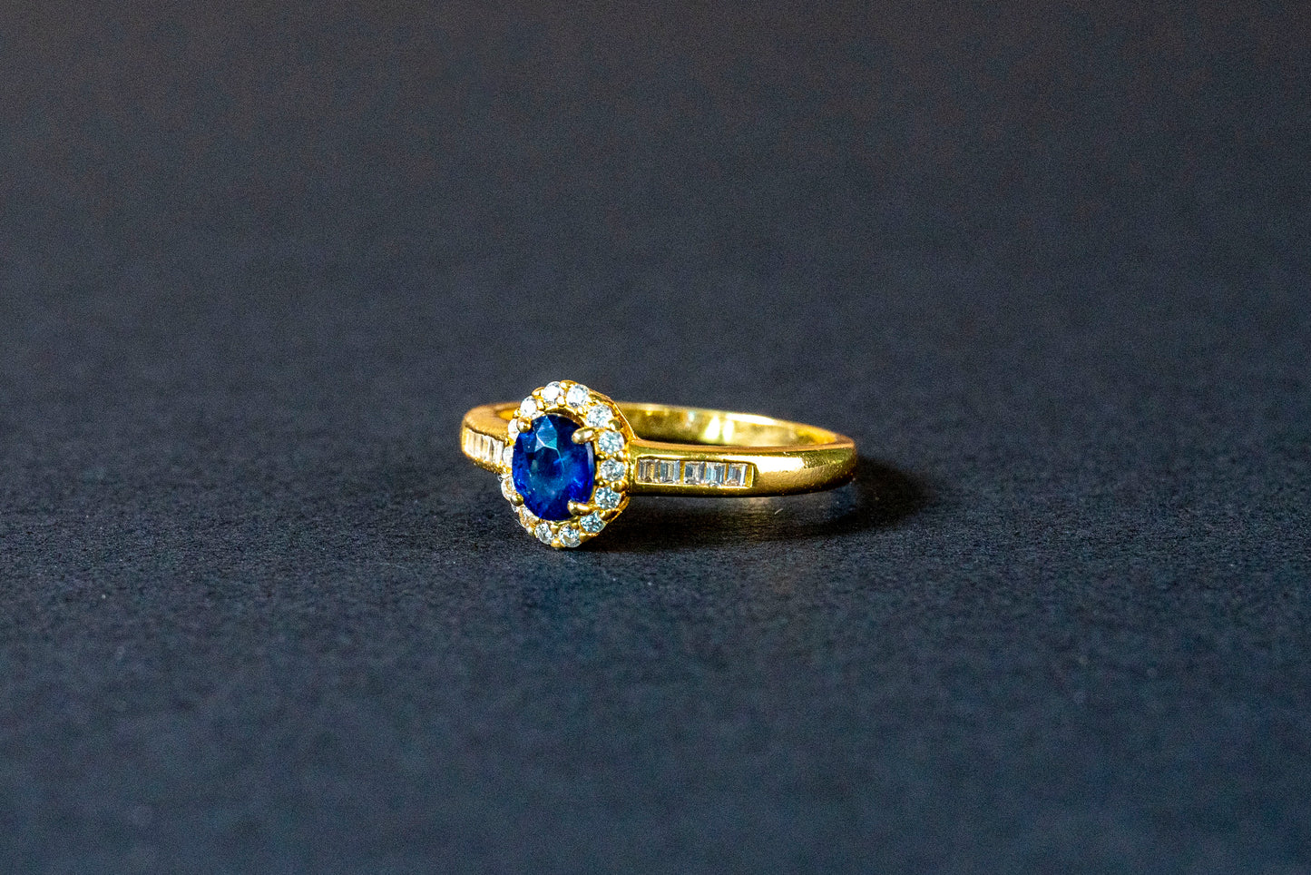 Oval Sapphire Elegance Ring with Diamond Accents in 18k Gold