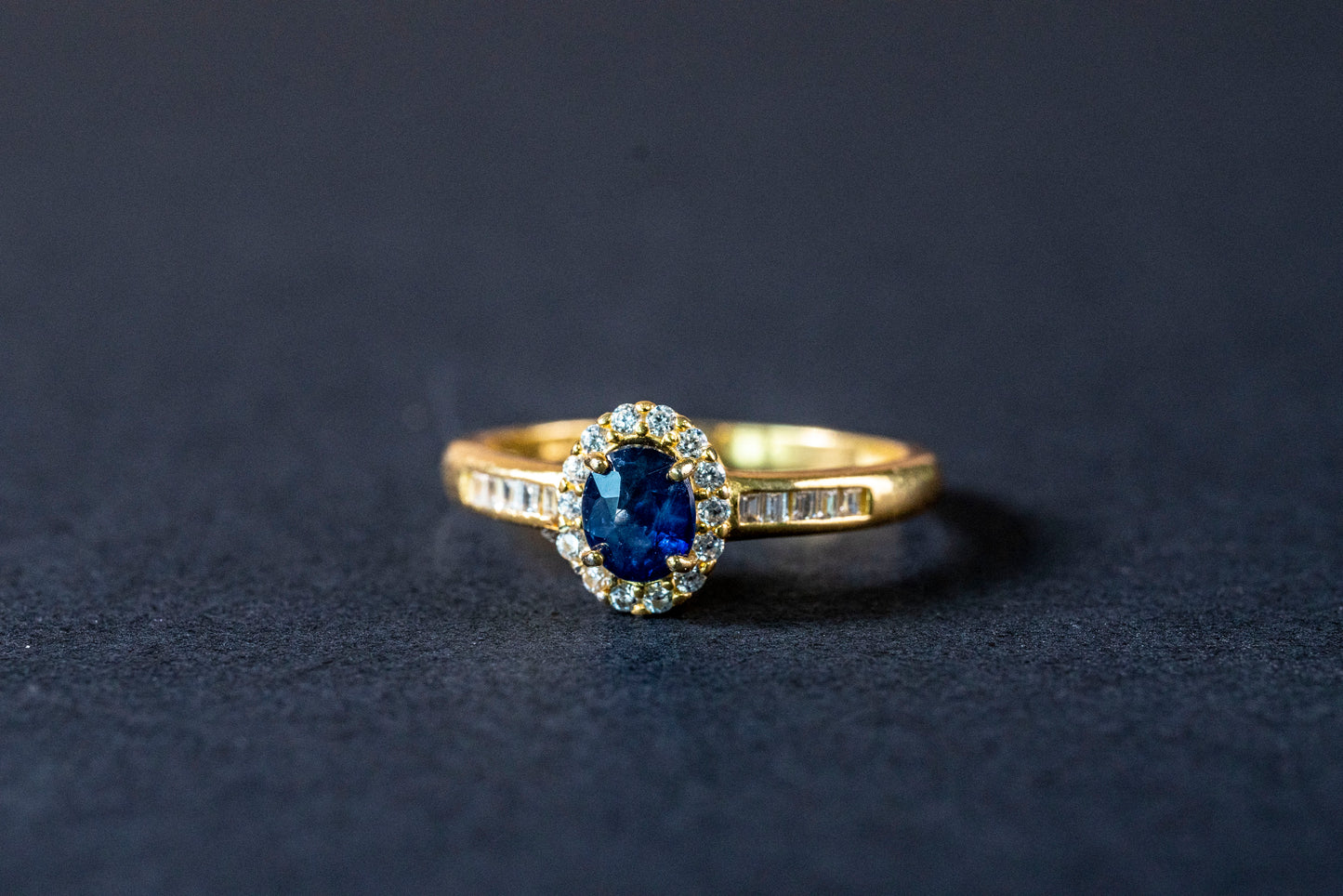 Oval Sapphire Elegance Ring with Diamond Accents in 18k Gold