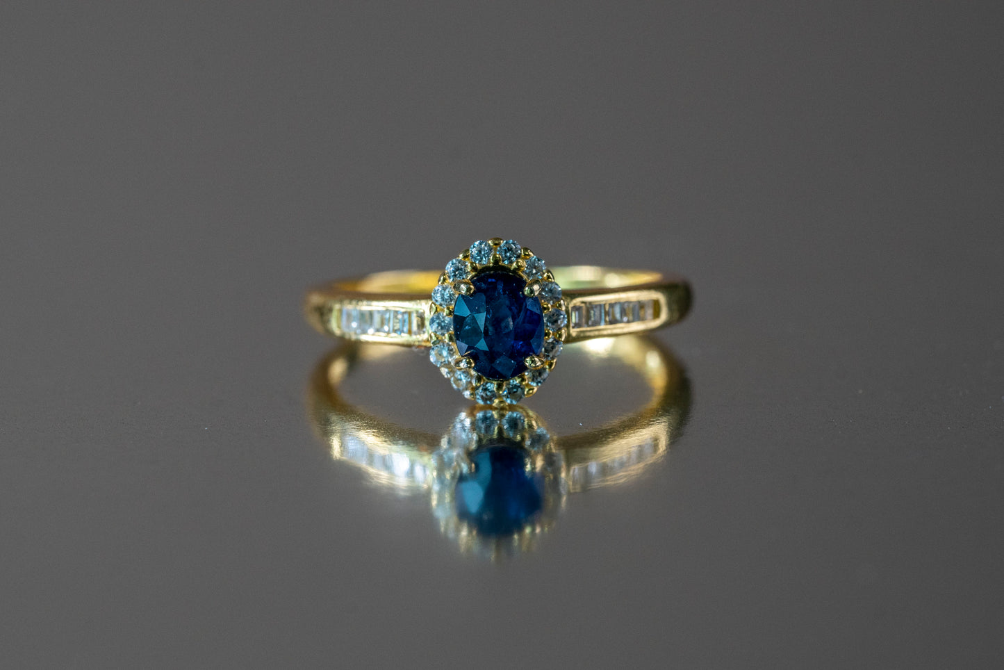 Oval Sapphire Elegance Ring with Diamond Accents in 18k Gold