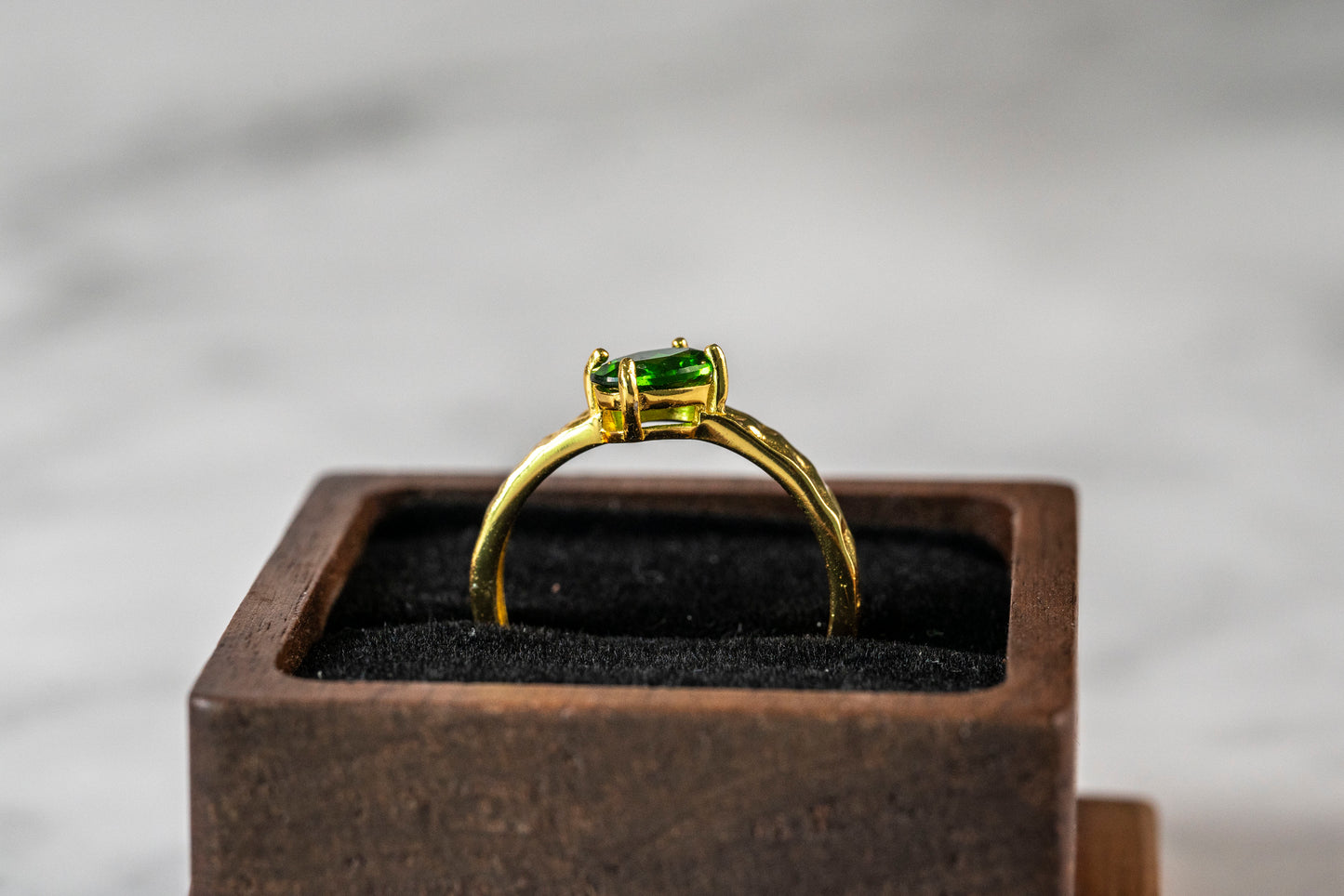 Artisanal Diopside Solitaire in Faceted 18K Gold Band