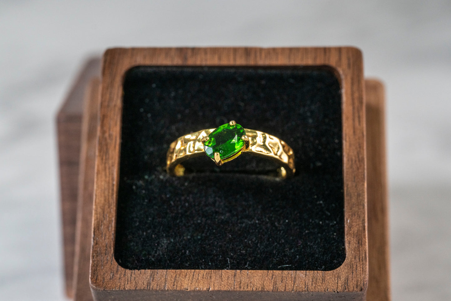 Artisanal Diopside Solitaire in Faceted 18K Gold Band