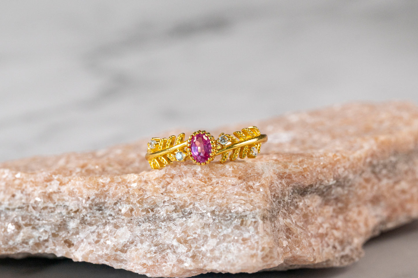 Blushing Blossom Paparacha Sapphire Ring with Leaf Band in 18K Gold