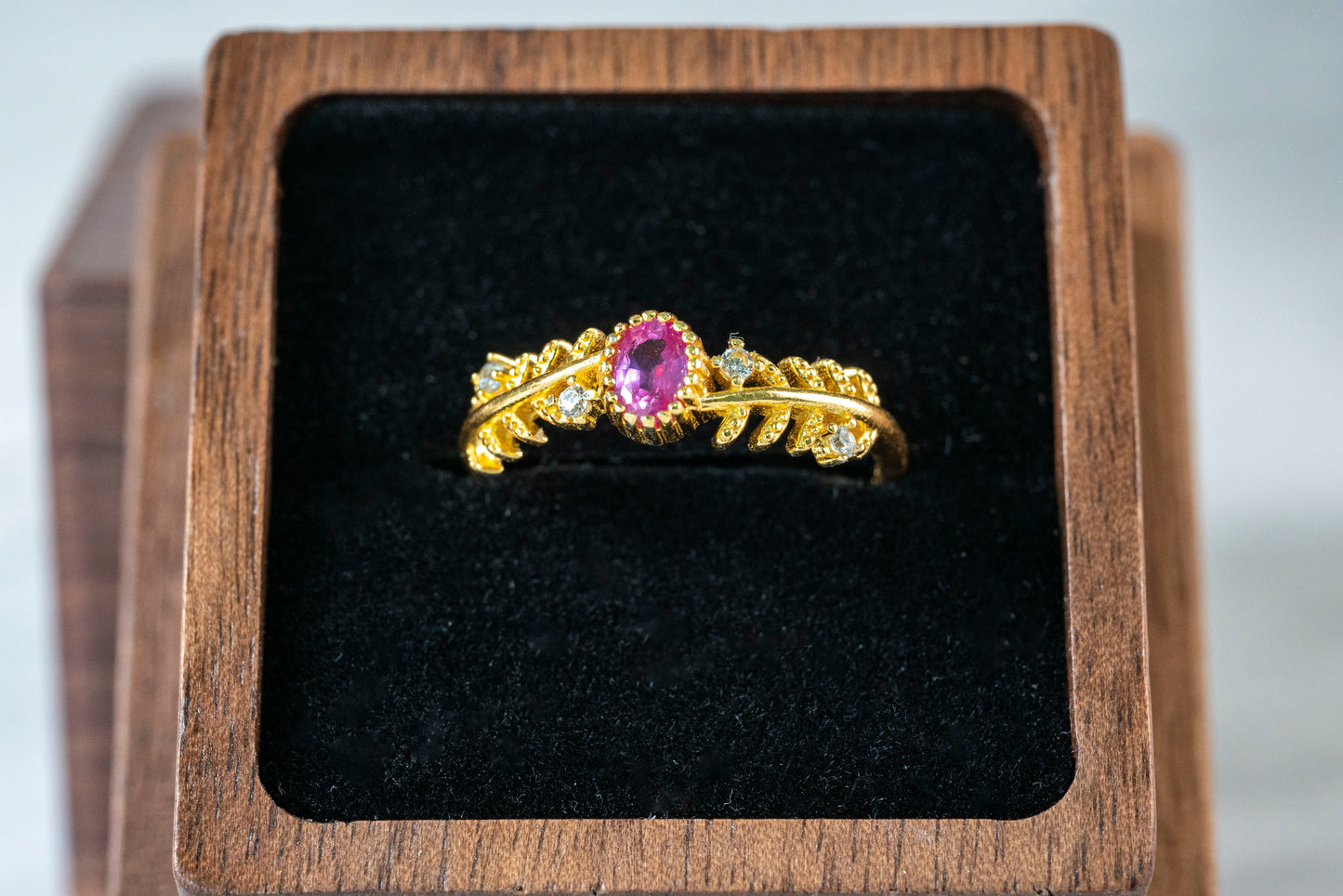 Blushing Blossom Paparacha Sapphire Ring with Leaf Band in 18K Gold