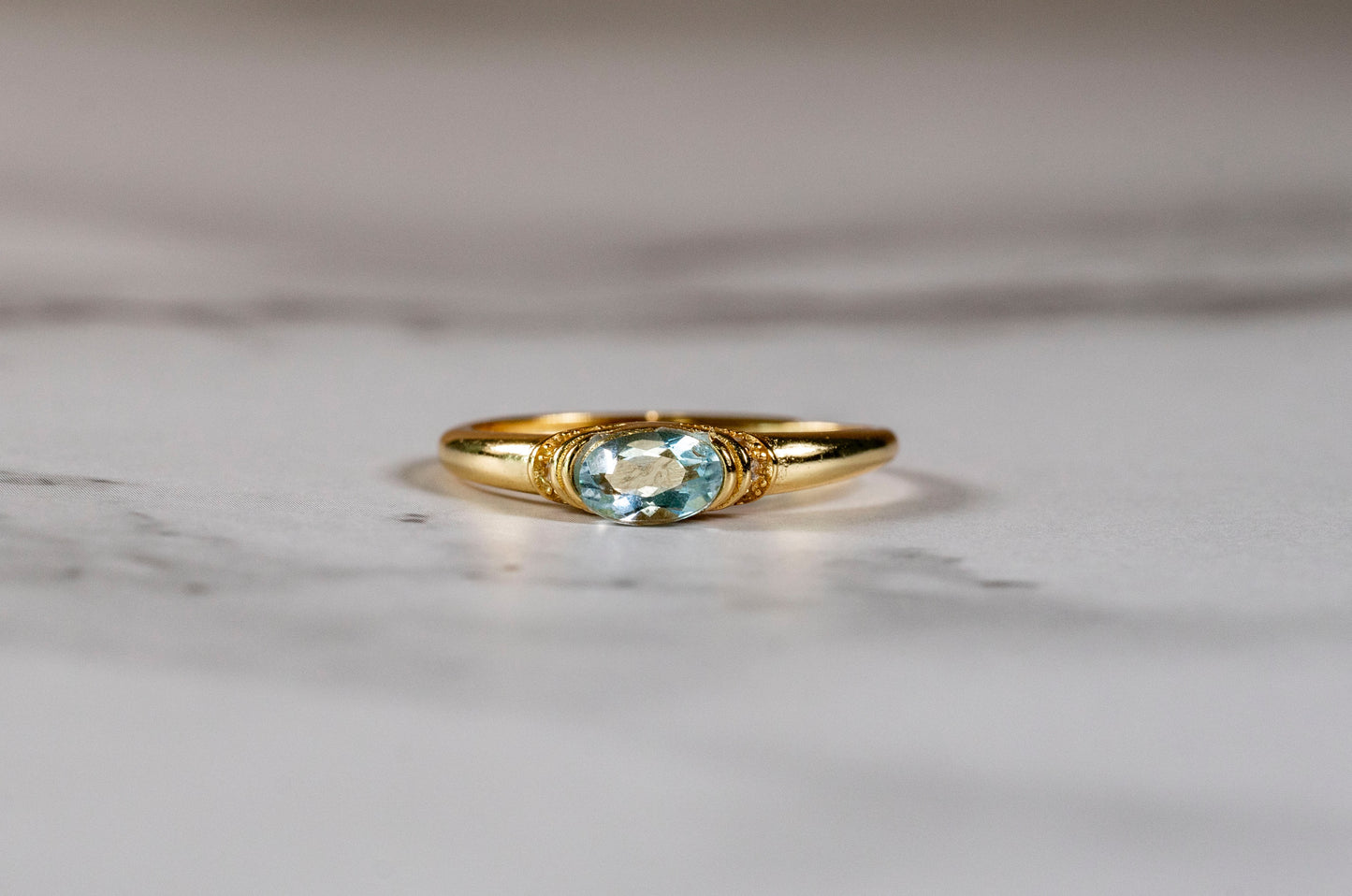 Ocean's Whisper Oval Aquamarine Ring in 18k Gold